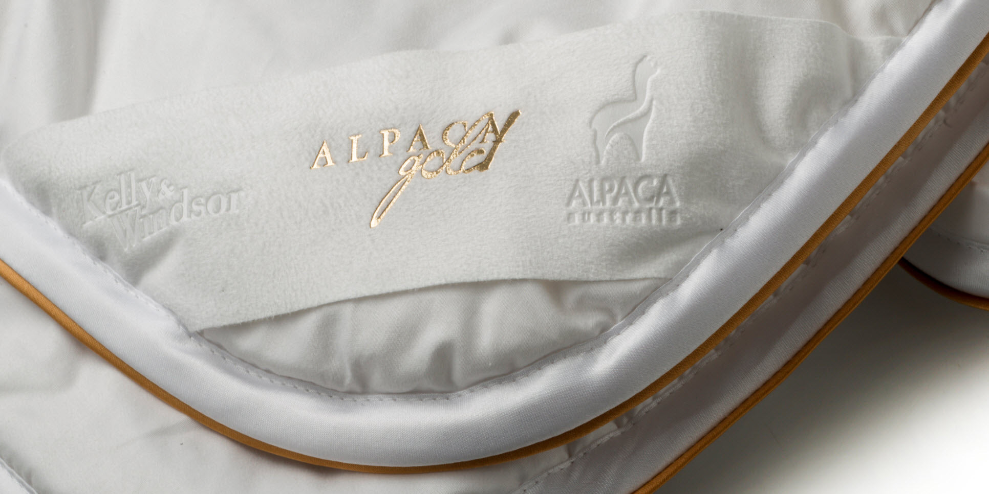 Luxury trim and binding on alpaca gold quilts